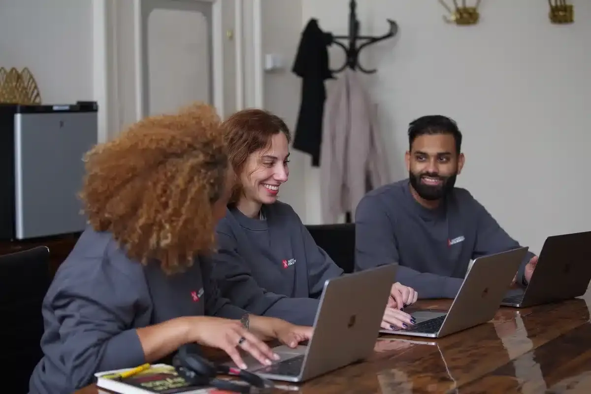 Three participants working together at Amsterdam Data Academy